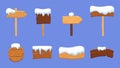 Wooden signs and snow caps. Winter wood arrows, banners and symbols under snowy. Decorative village elements, isolated