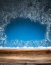 Wooden sill and frozen window.