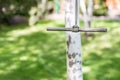 Wooden single rope swing in garden on bright sunny day. Green grass lawn on background. Children having fun and summer Royalty Free Stock Photo