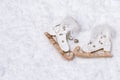 Wooden skates toy on snow with empty space. Concept for New Year or Merry Christmas Royalty Free Stock Photo