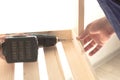 Wooden slats and working tools. Carpentry work. Working with power tools