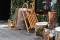 Wooden sled with stumps and glass candlesticks