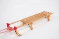 Wooden sledge in the snow