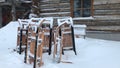 Wooden sledges covered with snow, Kakslauttanen, Finland Royalty Free Stock Photo