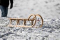 Wooden sledges in the snow