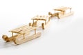 Wooden sledges on white background