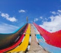 A wooden slide worn out of colors