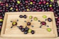 Wooden slitter for preparing seasoned slit olives