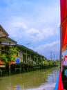 Wooden slums on stilts the riverside of Chao Praya River in Bangkok, Thailand Royalty Free Stock Photo