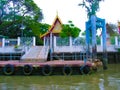 Wooden slums on stilts the riverside of Chao Praya River in Bangkok, Thailand Royalty Free Stock Photo