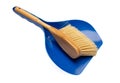 Small brush and blue dustpan isolated on white background. Broom with handle and plastic scoop set Royalty Free Stock Photo