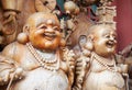 Wooden smiling buddha