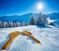Wooden snowshoes in the snow over mountains and snowy forest Royalty Free Stock Photo