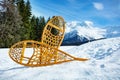 Wooden snowshoes in the snow over winter mountain Alpine peak