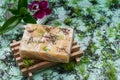 Wooden Soap Holder with Handmade Almond Scented Goat`s Milk Bar Soap decorated with Orchid Flower, Bamboo and flower sprinkles