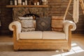 Wooden Sofa in Chalet Cozy Interior with Fireplace Royalty Free Stock Photo