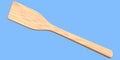 Wooden solid turner or kitchen utensils on blue background.