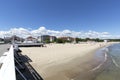 Wooden Sopot pier in sunny day, view of the Grand Hotel and sandy beach, Sopot, Poland