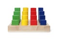 Wooden sorter with colorful geometric figures isolated on white. Children\'s toy
