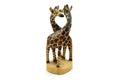 Wooden soul mate giraffe statue isolated on white background