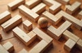 Wooden sphere in labyrinth of wood blocks on rustic table. Shows challenge, problem solving, decision making. Complex path to Royalty Free Stock Photo