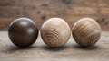 Wooden spheres showcasing natural patterns. Oak and teak wood texture Royalty Free Stock Photo