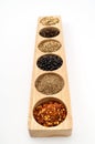 Wooden Spice Rack Filled with Spices