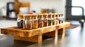 A wooden spice rack with several bottles of spices Royalty Free Stock Photo
