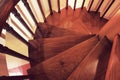 Wooden Spiral staircase made of antique wood Royalty Free Stock Photo