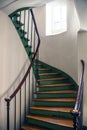 Wooden spiral staircase in old building, Paris, France Royalty Free Stock Photo