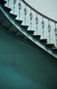 Wooden spiral stairs in ancient interior Royalty Free Stock Photo