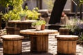 wooden spools reused as rustic outdoor tables