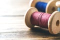 Wooden spools of thread close-up. Selective focus. Rendered image. Copy space