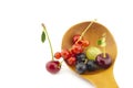 Wooden spoon with assorted fresh fruit Royalty Free Stock Photo