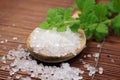 Wooden spoon with bath salt Royalty Free Stock Photo