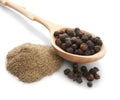 Wooden spoon with black pepper grains Royalty Free Stock Photo