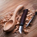 Wooden spoon with carvin tools
