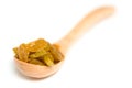 Wooden Spoon with dried raisin