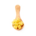 Wooden spoon filled with dry ditalini pasta over isolated white background Royalty Free Stock Photo