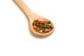 wooden spoon filled with spices isolated Royalty Free Stock Photo