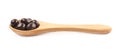 Wooden spoon full of candies Royalty Free Stock Photo