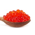 Wooden spoon full of red caviar Royalty Free Stock Photo