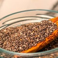 Wooden Spoon In A Glass Jar Filled With Chia Seeds Royalty Free Stock Photo