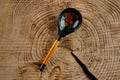 A wooden spoon handmade with a painting in the Russian style of Khokhloma Royalty Free Stock Photo