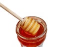 Wooden spoon and a jar of polyfloral bee honey. The concept of beekeeping Royalty Free Stock Photo