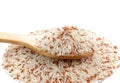 Wooden spoon and jasmine brown rice close up Royalty Free Stock Photo