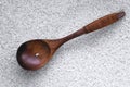 white rice in a wooden spoon