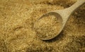 Wooden spoon on pile brown cane sugar texture background. Raw natural, Organic cane sugar Royalty Free Stock Photo