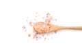 Wooden spoon with pink himalayan salt isolated, top view Royalty Free Stock Photo