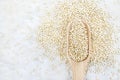 Wooden spoon of quinoa, gluten free ancient grain for healthy diet